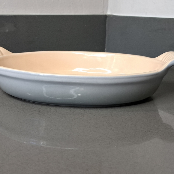 Le Creuset Oval Baker in Cream and White Stoneware